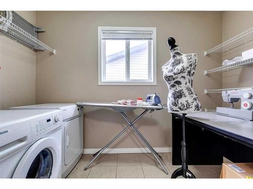 321 Bridleridge View Sw, Calgary, AB - Indoor Photo Showing Laundry Room