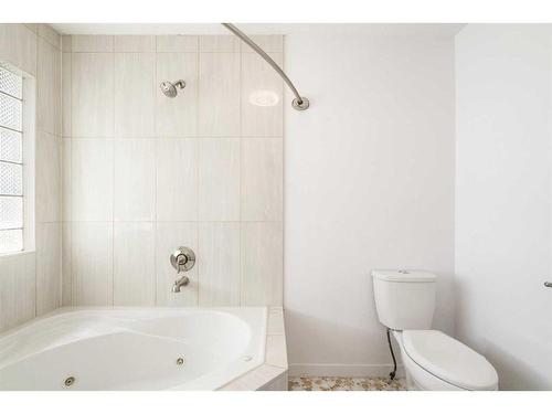 245 Sandstone Drive Nw, Calgary, AB - Indoor Photo Showing Bathroom
