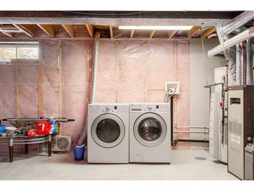 245 Sandstone Drive Nw, Calgary, AB - Indoor Photo Showing Laundry Room