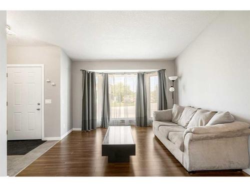 245 Sandstone Drive Nw, Calgary, AB - Indoor Photo Showing Living Room