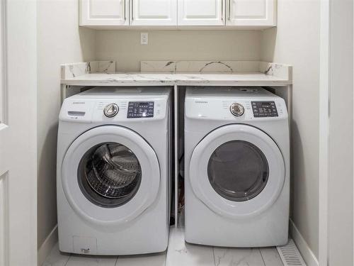 100 Tarington Place Ne, Calgary, AB - Indoor Photo Showing Laundry Room