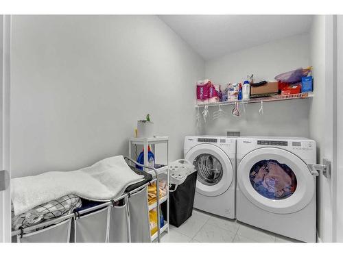 549 Corner Meadows Way Ne, Calgary, AB - Indoor Photo Showing Laundry Room