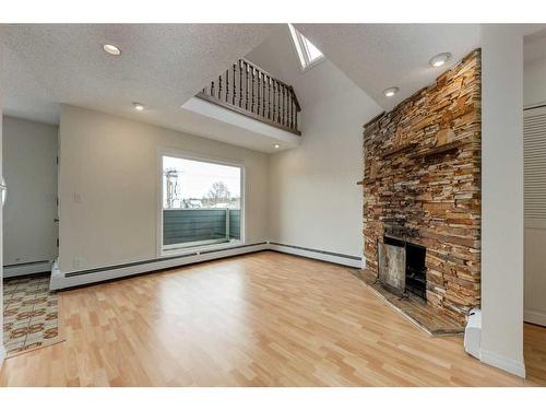 301-1817 14A Street Sw, Calgary, AB - Indoor With Fireplace
