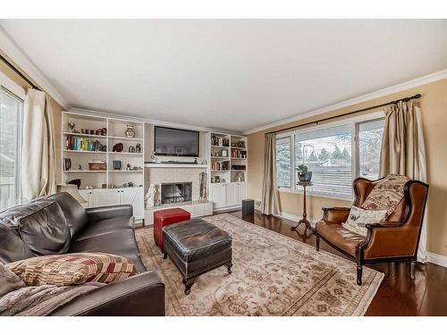 2304 Paliswood Road Sw, Calgary, AB - Indoor Photo Showing Living Room With Fireplace