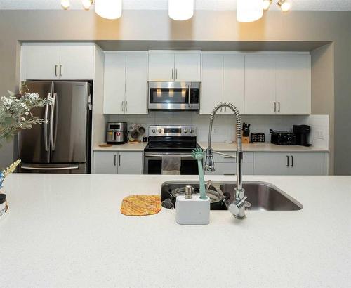 60 Cornerstone Avenue, Calgary, AB - Indoor Photo Showing Kitchen With Double Sink