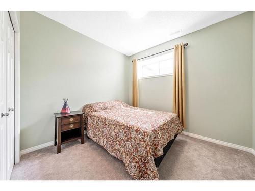 67 Buckskin Way, Cochrane, AB - Indoor Photo Showing Bedroom
