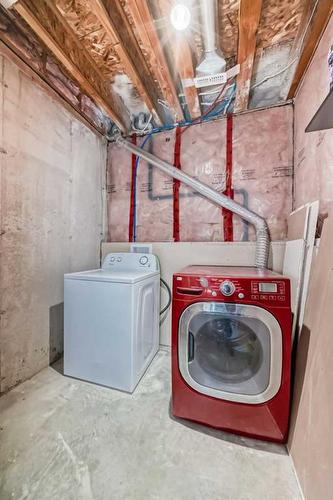 83 Panatella Hill Nw, Calgary, AB - Indoor Photo Showing Laundry Room