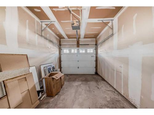 83 Panatella Hill Nw, Calgary, AB - Indoor Photo Showing Garage