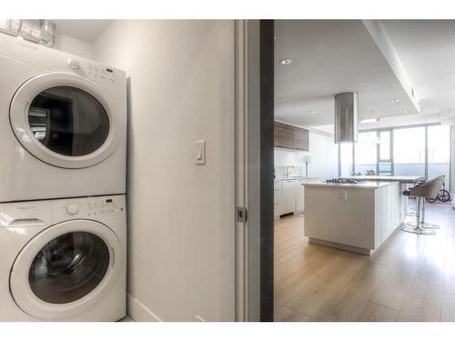 401-1087 2 Avenue Nw, Calgary, AB - Indoor Photo Showing Laundry Room