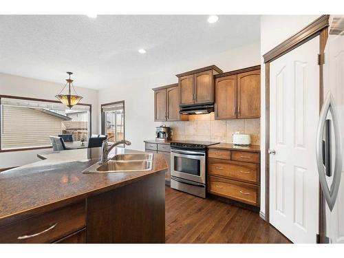 333 Mckenzie Towne Drive Se, Calgary, AB - Indoor Photo Showing Kitchen With Stainless Steel Kitchen With Double Sink