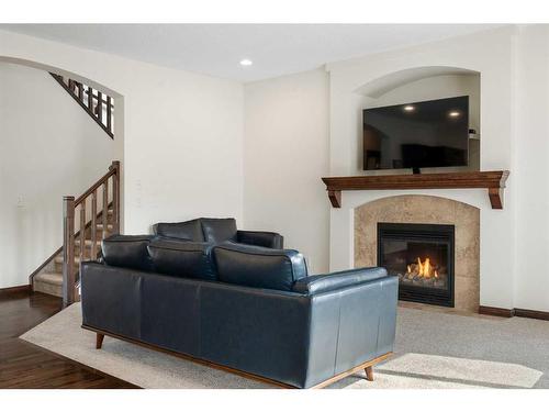 333 Mckenzie Towne Drive Se, Calgary, AB - Indoor Photo Showing Living Room With Fireplace