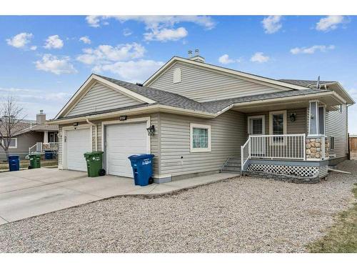 433 Stonegate Way Nw, Airdrie, AB - Outdoor With Deck Patio Veranda