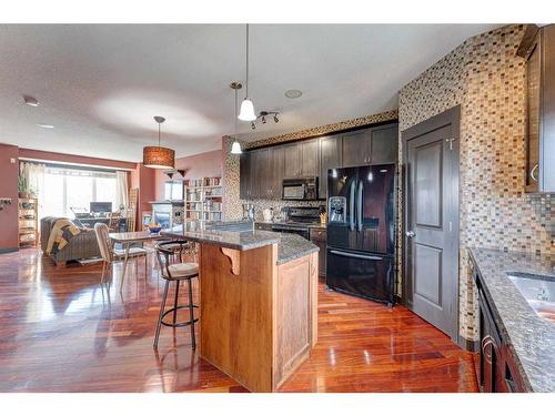 288 Rainbow Falls Drive, Chestermere, AB - Indoor Photo Showing Kitchen With Upgraded Kitchen