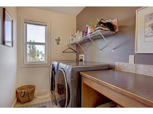 50 Elgin Park Road Se, Calgary, AB - Indoor Photo Showing Laundry Room