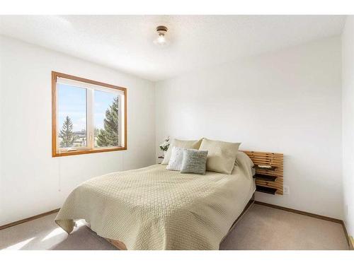 14220 Evergreen Street Sw, Calgary, AB - Indoor Photo Showing Bedroom