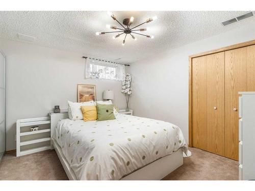 14220 Evergreen Street Sw, Calgary, AB - Indoor Photo Showing Bedroom