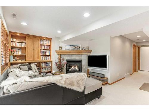 14220 Evergreen Street Sw, Calgary, AB - Indoor Photo Showing Other Room With Fireplace