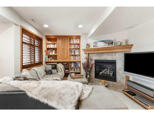 14220 Evergreen Street Sw, Calgary, AB - Indoor Photo Showing Living Room With Fireplace