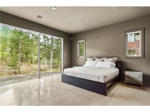 600 Silvertip Road, Canmore, AB - Indoor Photo Showing Bedroom