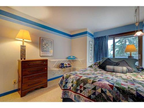 220 Pump Hill Rise Sw, Calgary, AB - Indoor Photo Showing Bedroom