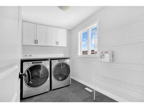 162 Bayview Circle Sw, Airdrie, AB - Indoor Photo Showing Laundry Room