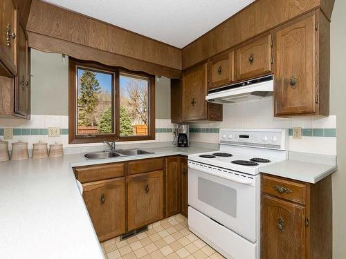 5861 Dalcastle Drive Nw, Calgary, AB - Indoor Photo Showing Kitchen With Double Sink