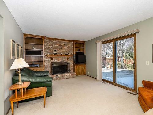 5861 Dalcastle Drive Nw, Calgary, AB - Indoor With Fireplace