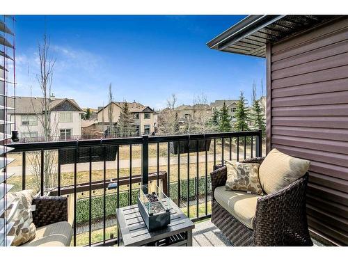 100 Cougar Ridge Manor Sw, Calgary, AB - Outdoor With Deck Patio Veranda With Exterior