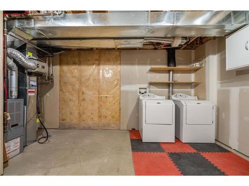 161 Tuscany Court Nw, Calgary, AB - Indoor Photo Showing Laundry Room