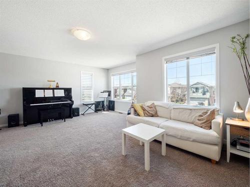 540 Auburn Bay Drive Se, Calgary, AB - Indoor Photo Showing Living Room