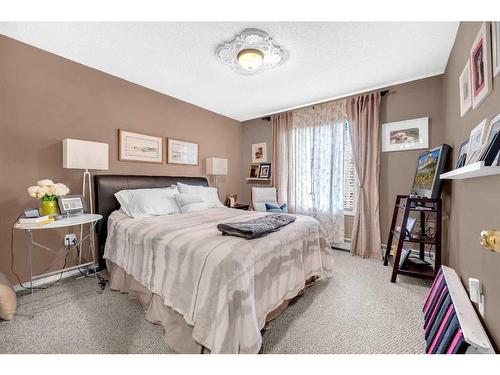 2110-2000 Millrise Point Sw, Calgary, AB - Indoor Photo Showing Bedroom