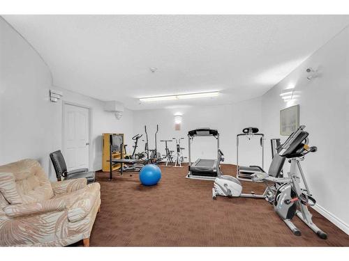 2110-2000 Millrise Point Sw, Calgary, AB - Indoor Photo Showing Gym Room