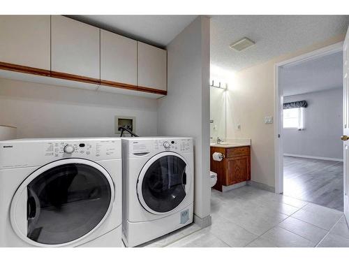 12 Hawkfield Rise Nw, Calgary, AB - Indoor Photo Showing Laundry Room