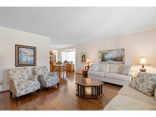 239 Parkland Crescent Se, Calgary, AB - Indoor Photo Showing Living Room