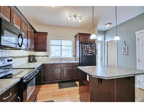 86 Kincora Heath Nw, Calgary, AB - Indoor Photo Showing Kitchen With Double Sink