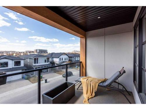 215-7820 Spring Willow Drive Sw, Calgary, AB - Outdoor With Balcony With Exterior