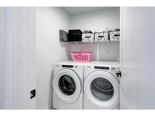 215-7820 Spring Willow Drive Sw, Calgary, AB - Indoor Photo Showing Laundry Room