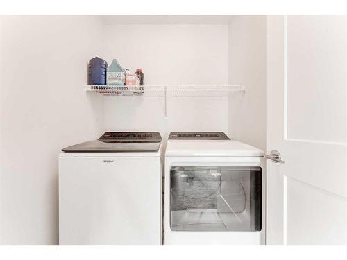 140 Ellen Road, Crossfield, AB - Indoor Photo Showing Laundry Room