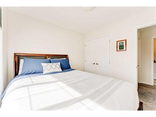 140 Ellen Road, Crossfield, AB - Indoor Photo Showing Bedroom