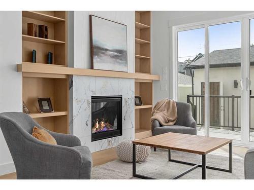 4131 18 Street Sw, Calgary, AB - Indoor Photo Showing Living Room With Fireplace