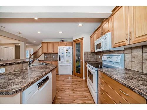 232 Everwillow Green Sw, Calgary, AB - Indoor Photo Showing Kitchen With Double Sink