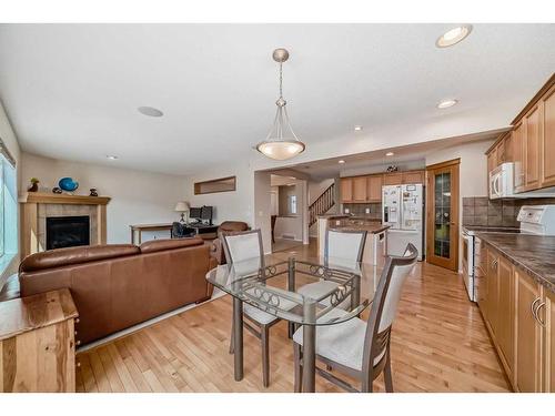 232 Everwillow Green Sw, Calgary, AB - Indoor With Fireplace