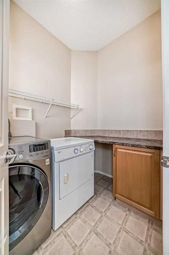 232 Everwillow Green Sw, Calgary, AB - Indoor Photo Showing Laundry Room
