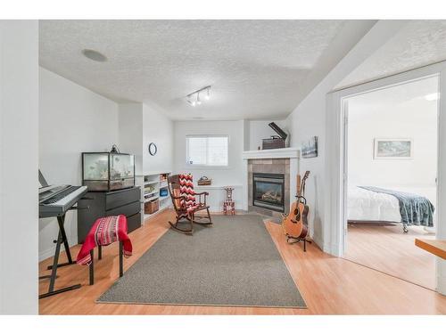 87 Arbour Meadows Close Nw, Calgary, AB - Indoor With Fireplace