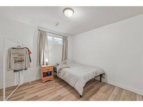87 Arbour Meadows Close Nw, Calgary, AB - Indoor Photo Showing Bedroom