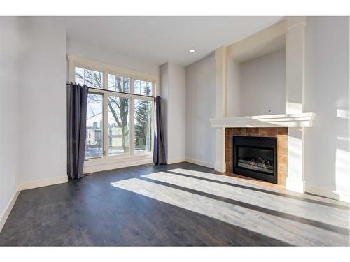 1106 Colgrove Avenue Ne, Calgary, AB - Indoor Photo Showing Living Room With Fireplace