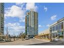 703-55 Spruce Place Sw, Calgary, AB  - Outdoor With Facade 