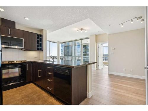 703-55 Spruce Place Sw, Calgary, AB - Indoor Photo Showing Kitchen With Upgraded Kitchen
