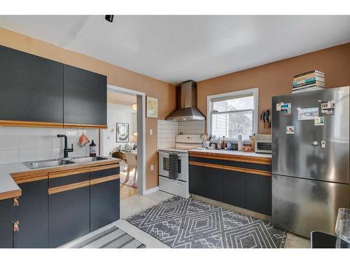 840 17 Avenue Se, Calgary, AB - Indoor Photo Showing Kitchen With Double Sink