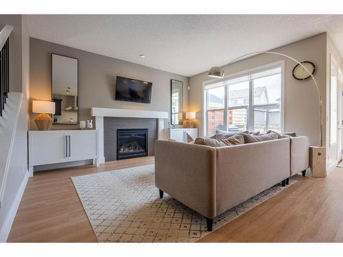 186 Chaparral Valley Way Se, Calgary, AB - Indoor Photo Showing Living Room With Fireplace